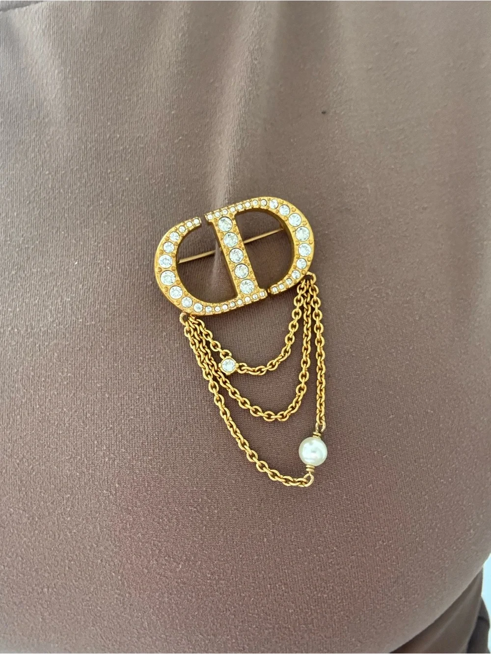 Dior gold tone